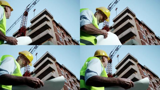 建筑师外国人建筑工程师看图纸