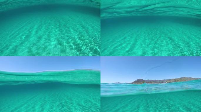 半水下: 沙质海底和风景秀丽的岛屿的电影拍摄。