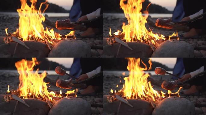 高清超级慢镜头：篝火上烤香肠