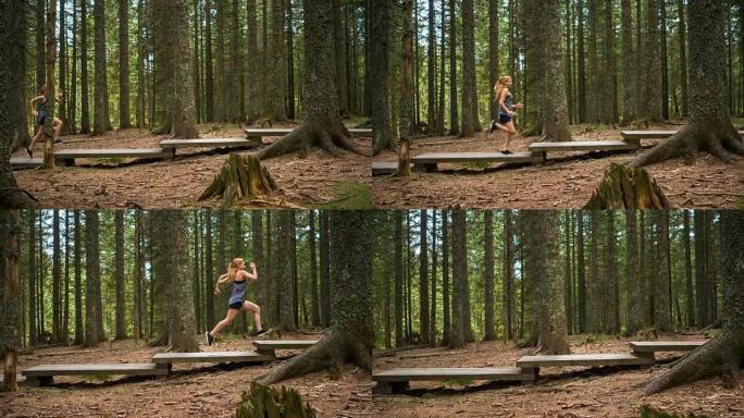 身体意识强的女人在做有氧运动，在树林中的木制道路上奔跑