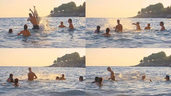 SLO MO年轻的朋友在海里玩耍