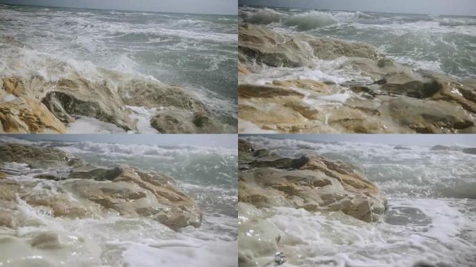 夏天海浪在白色海滩岩石上撞击
