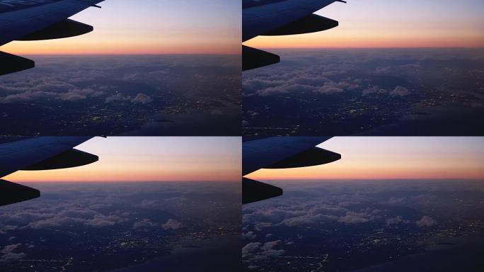 傍晚，飞机在云层上方飞越日本桑瓦纳市，4k