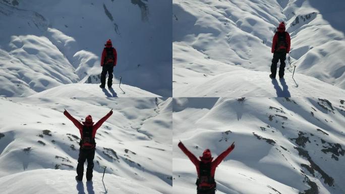 登山者在白雪覆盖的山上欢腾