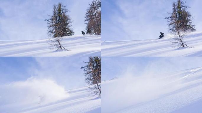 滑雪者做粉末转弯