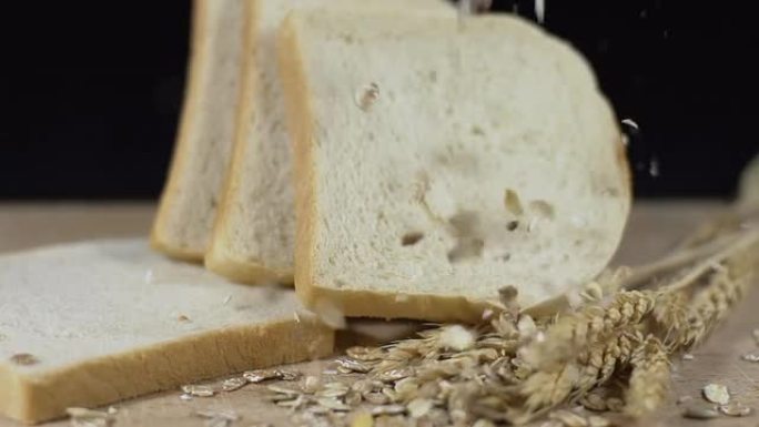 HD SUPER SLOW-MO：燕麦掉落在吐司和小麦上