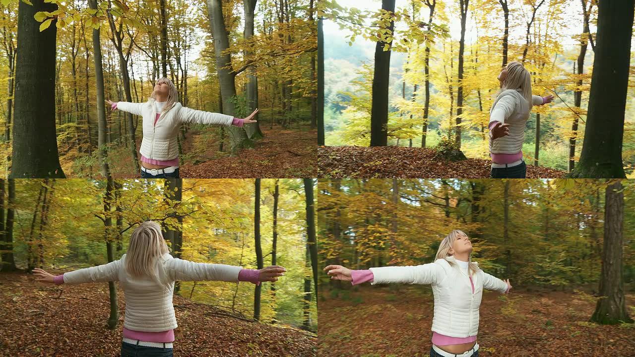 高清稳定镜头：女子向空中扔树叶
