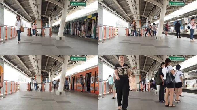 时间流逝: 人们在曼谷地铁站旅行