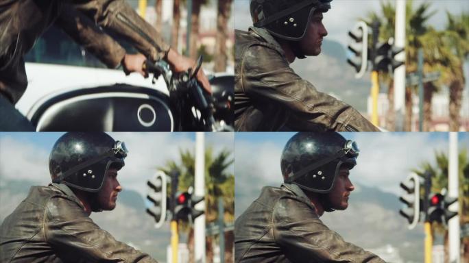 男子骑着摩托车穿过城市