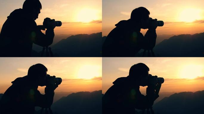 男子在山上旅行和摄影照片