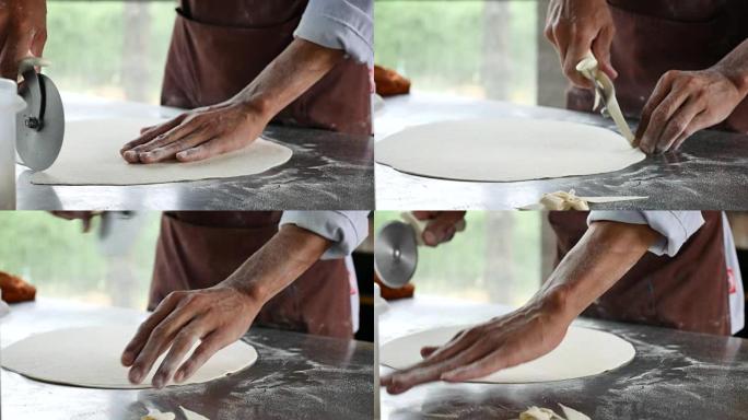 厨师切披萨的酵母面团