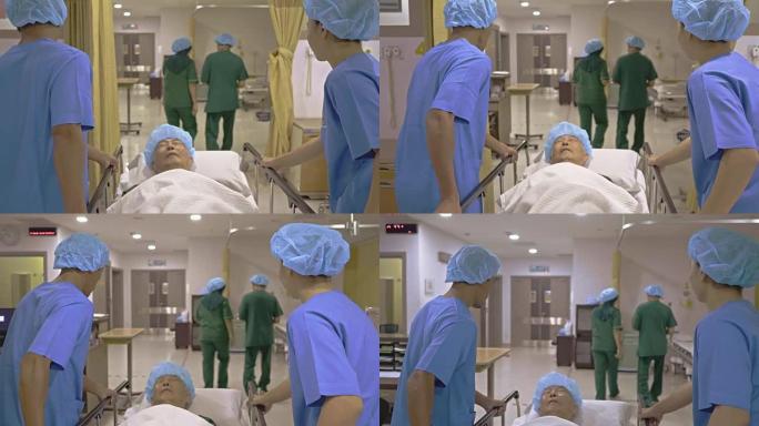 外科医生和护士在轮床上推病人的后视图视频