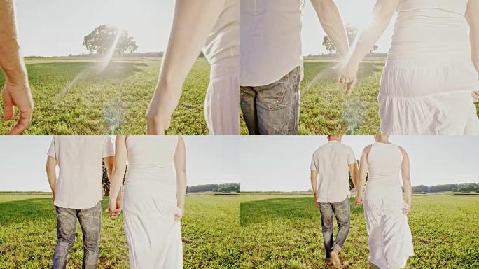 SLO MO爱心夫妇在草地上行走