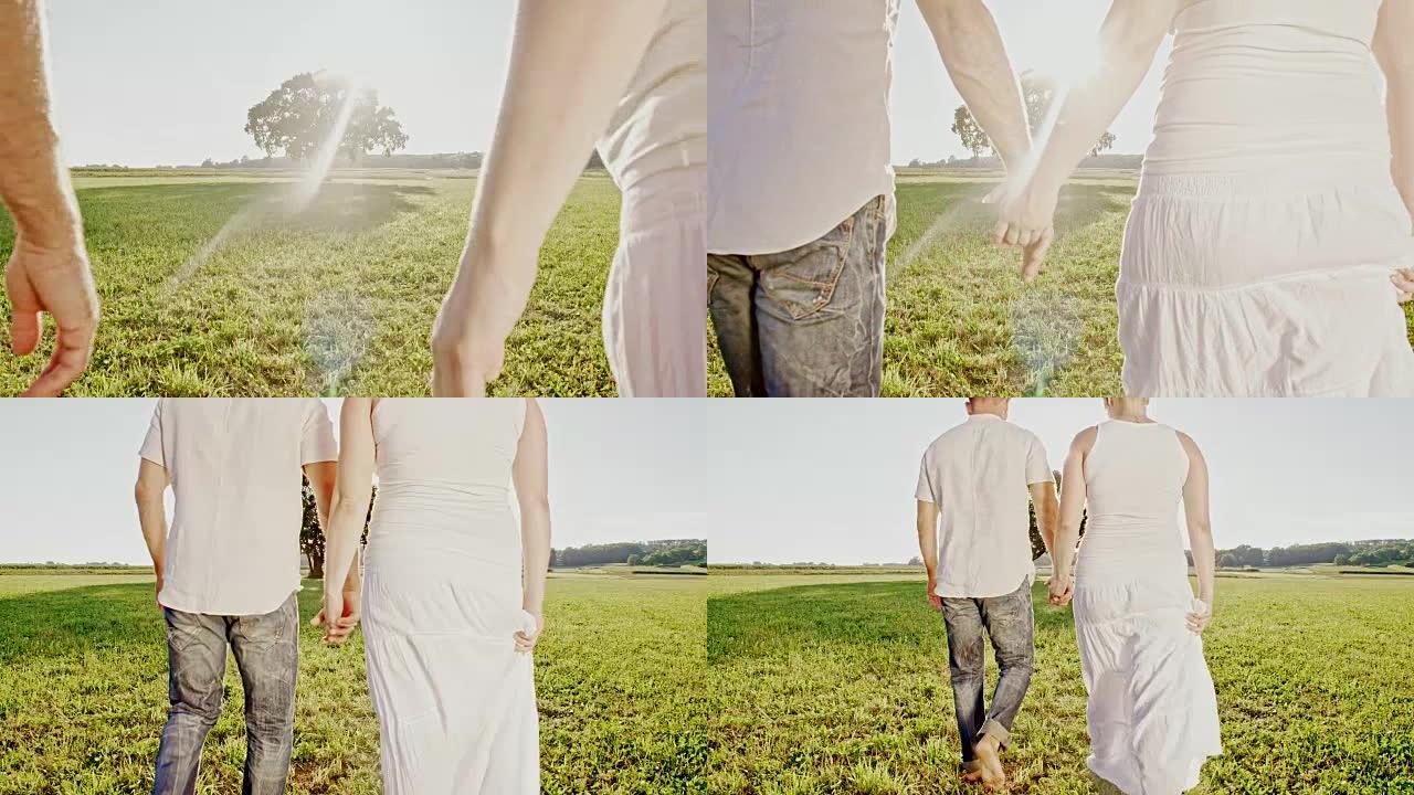 SLO MO爱心夫妇在草地上行走