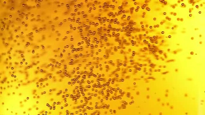 啤酒泡泡极端特写扰动旋转黄色液体