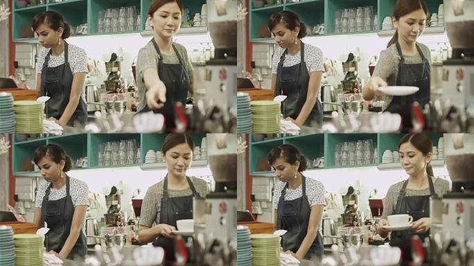 在吉隆坡咖啡店工作的亚洲女性