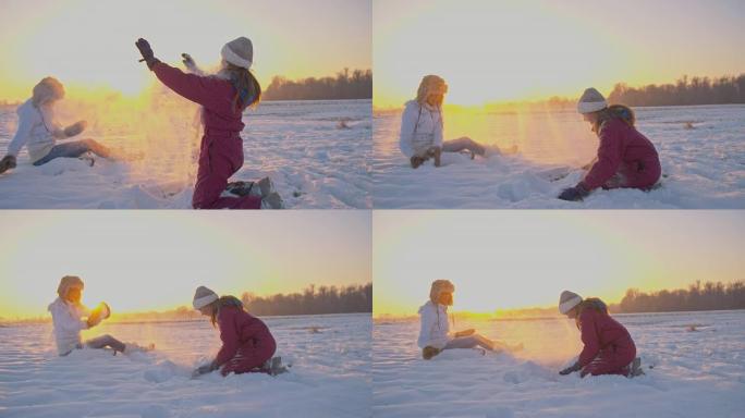 SLO MO母亲和女儿扔雪