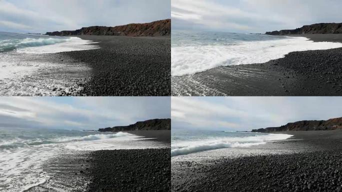 冰岛海岸有黑沙沙滩海浪海滩浪花航拍海滩