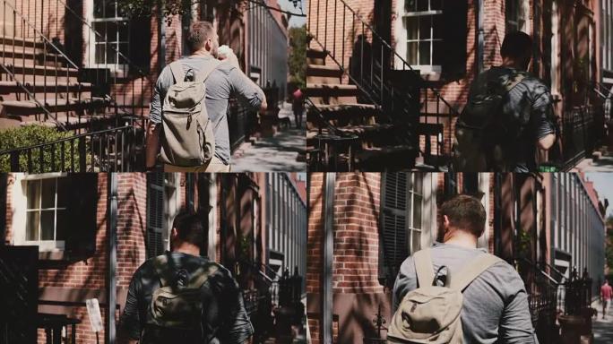 年轻轻松的白人男性游客背着背包沿着纽约阳光明媚的夏日城市街道散步喝咖啡
