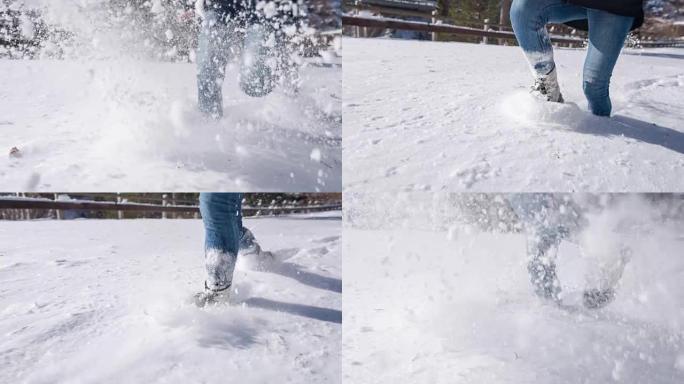 年轻女子在新鲜的积雪中膝盖深处奔跑