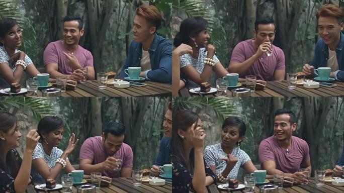 马来朋友在自助餐厅聊天的实时视频平移