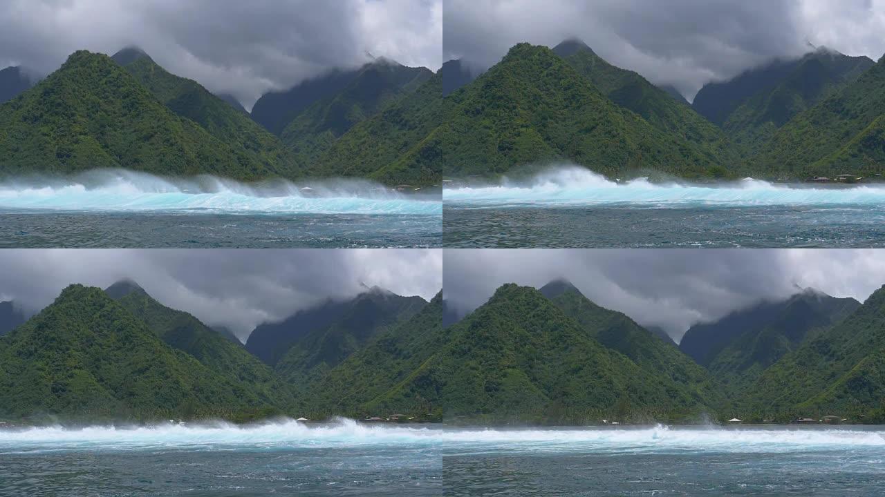 慢动作: 巨大的危险海浪冲向一个热带小岛。