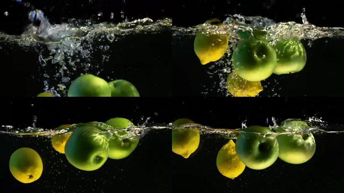 柠檬和苹果落入水中气泡的慢动作视频。孤立的黑色背景上的水果。