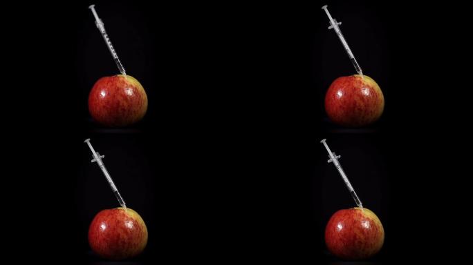 高清超级慢镜头：用注射器刺伤苹果