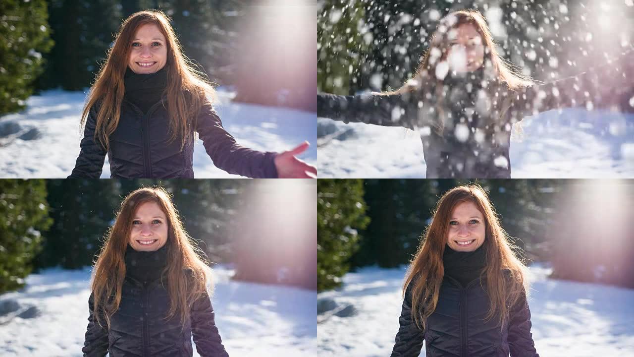 女人向空中扔雪扔雪