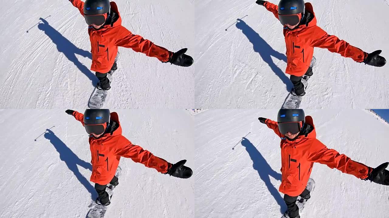 微笑的滑雪者伸出双臂，在雪坡上玩得开心