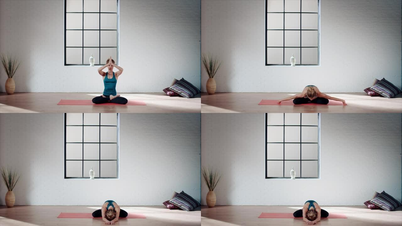 女人在健身房练习瑜伽 (莲花姿势)