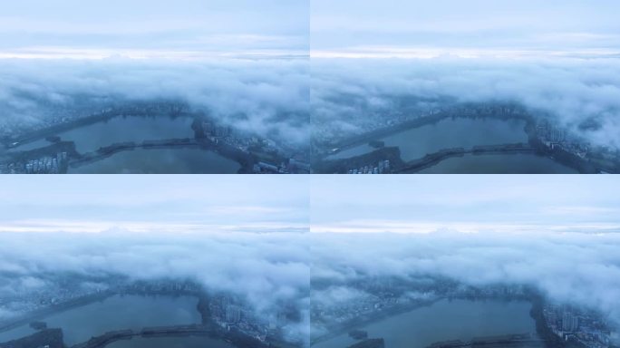 航拍云雾下的九江城景