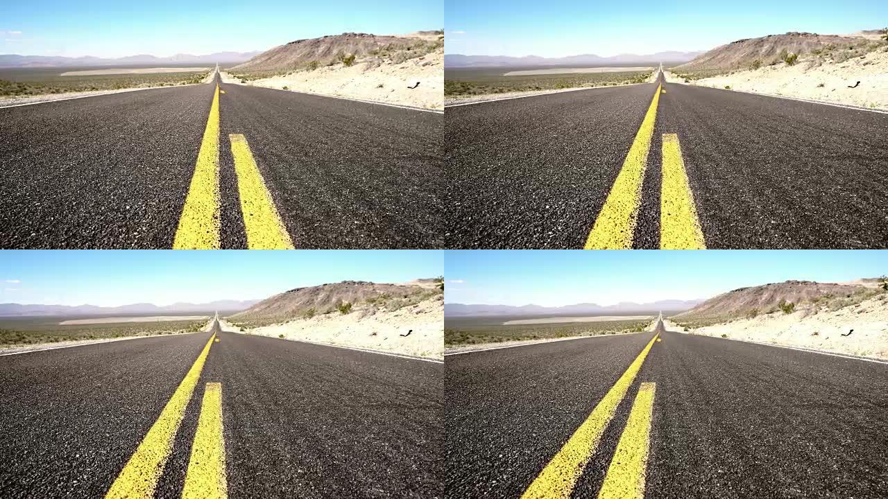 穿过沙漠的空旷道路上的DS道路线