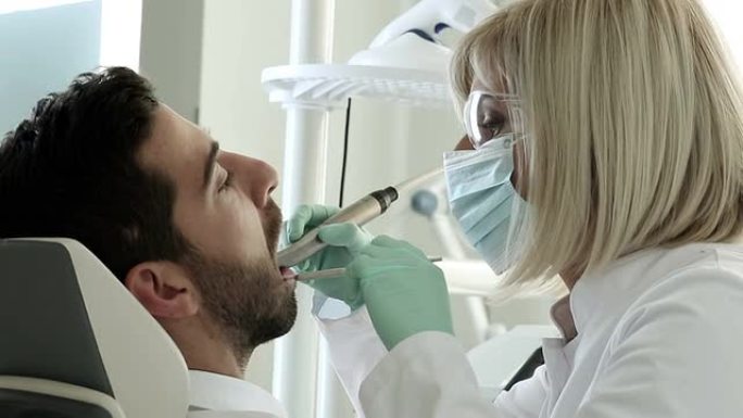 牙科手术牙科医生外国人激光牙齿美白