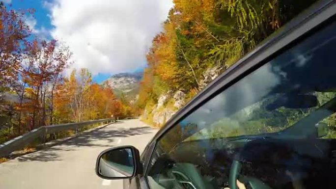 秋天在山口上开车骑车视角拍摄路程