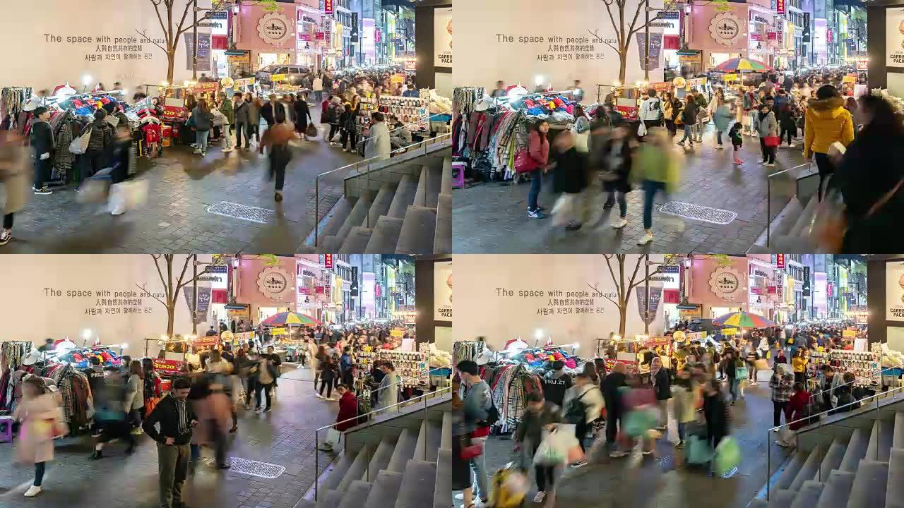 延时: 夜间在韩国首尔明洞市中心购物街的行人