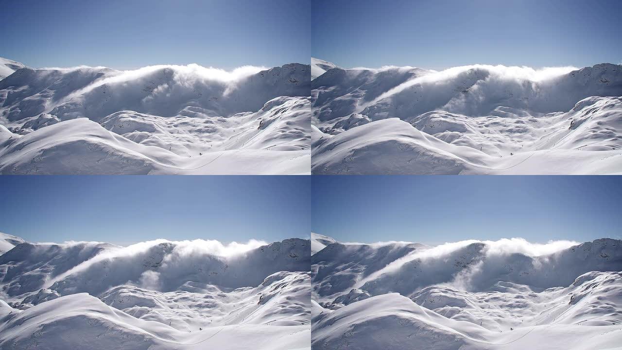 白雪皑皑的群山上的云朵