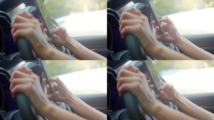 在汽车中使用智能手机的女商人，特写镜头