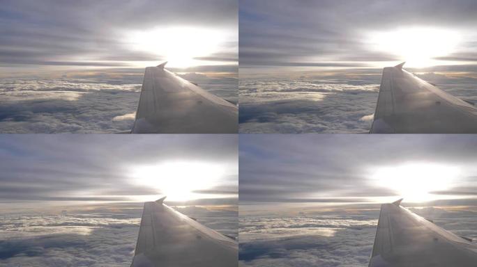 从飞机窗口观看云海高空机翼机舱窗外