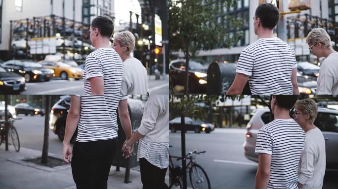 慢动作快乐的浪漫情侣在纽约晚间美丽的街道上行走时讨论未来的计划
