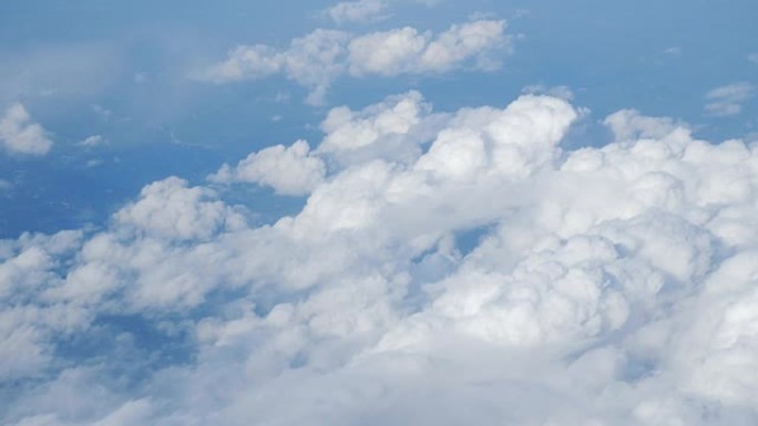 云俯拍蓝天白云飞机窗外