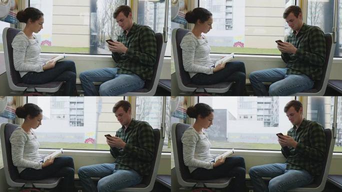 两名骑有轨电车的年轻人