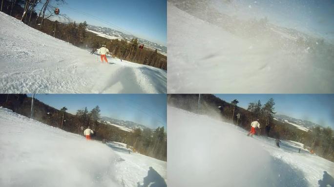 HD慢速运动：跟随滑雪者滑下滑雪坡