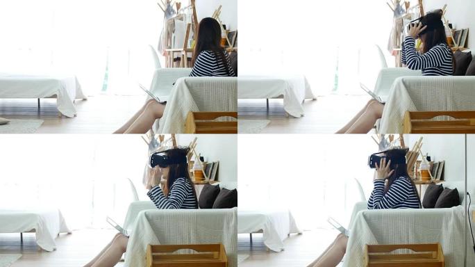 女人在家中使用虚拟现实眼镜在客厅玩耍