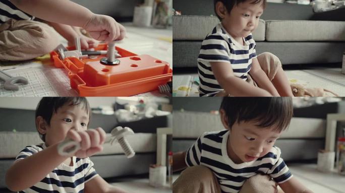 亚洲小男孩在家玩玩具