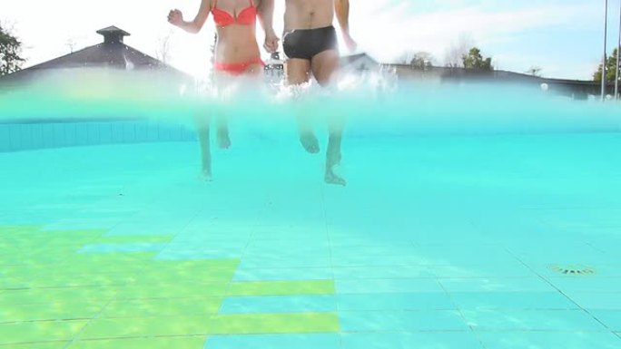高清超级慢镜头：情侣在泳池里奔跑