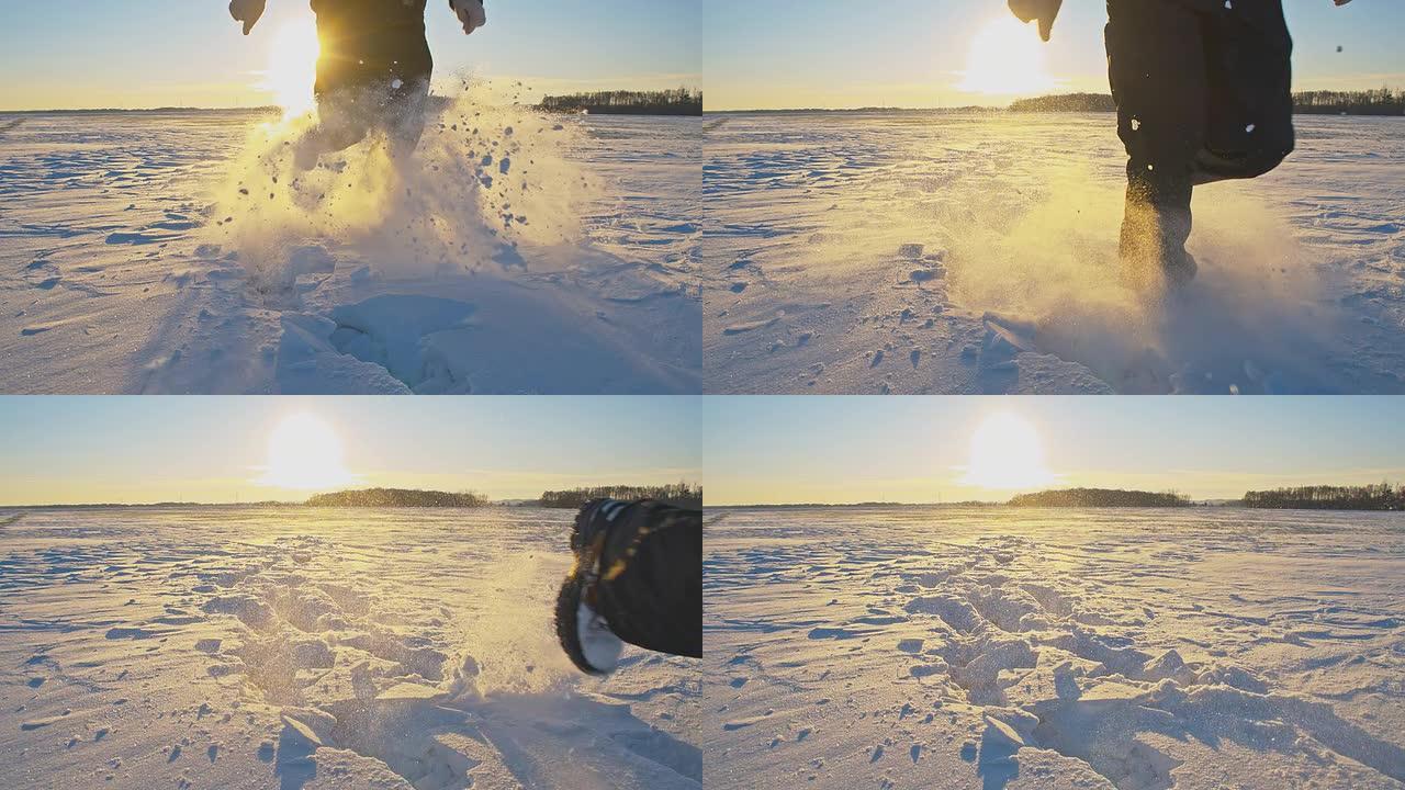 SLO MO在日落的雪地里跑步