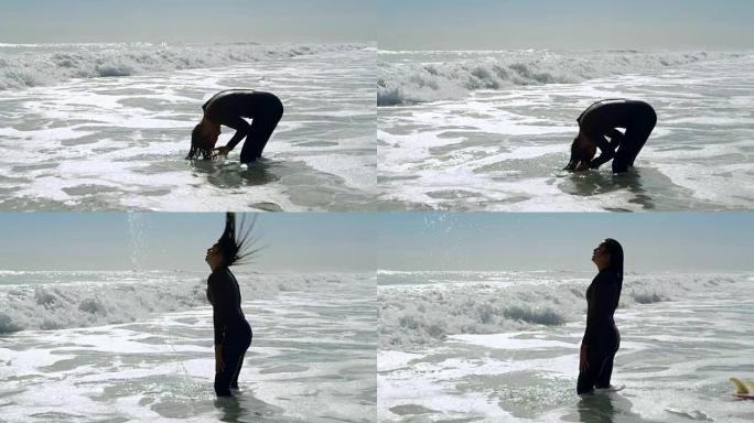 女冲浪者在海里4k翻转湿头发
