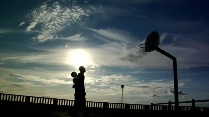 篮球孩子夕阳投篮日落