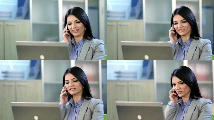 使用手机的商务女性